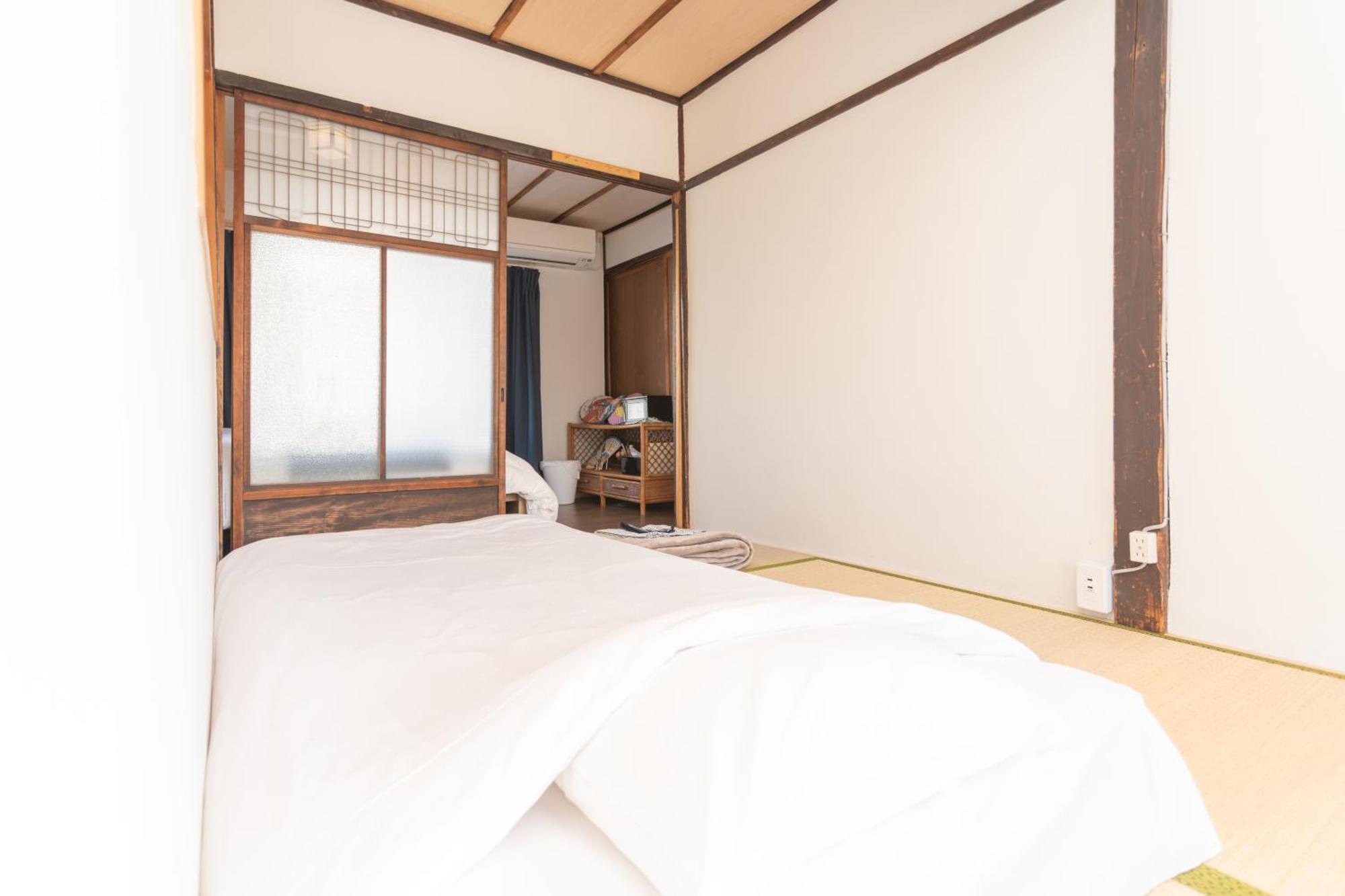 Guesthouse Oneworld Shijo四条京町屋 Kyoto Exterior foto